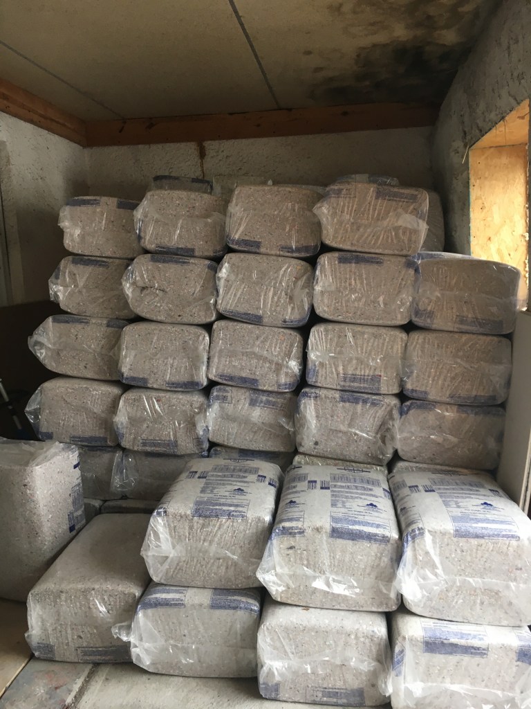 Stacked bags of insulation