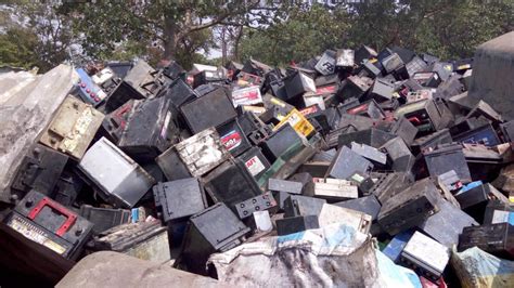 Heap of discarded lead acid batteries